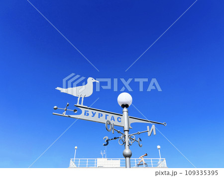 Burgas weathercock with zool city sign blue sky summer in port Burgas weathercock with zool city sign blue sky summer in port 109335395