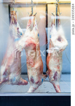 lamb carcasses in window of butcher shop in Batumi lamb carcasses in window of butcher shop in Batumi 109335864