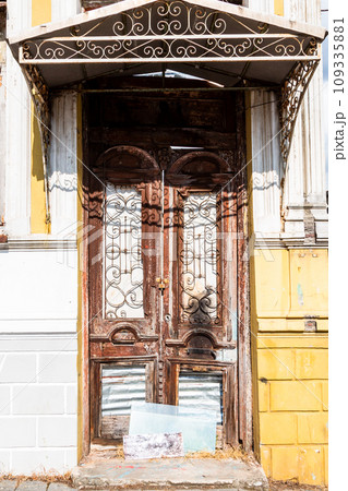 shabby entrance door of urban house in Batumi city shabby entrance door of urban house in Batumi city 109335881