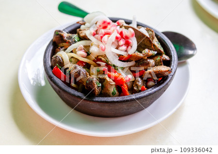 portion of Kuchmachi in ceramic bowl in local cafe portion of Kuchmachi in ceramic bowl in local cafe 109336042