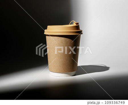 Carton paper disposable cup, brown coffee mug mockup with beige cap, lid Carton paper disposable cup, brown coffee mug mockup with beige cap, lid 109336749