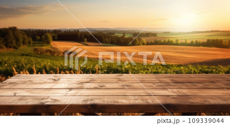 Empty wooden table top with farm landscape whit tractor during the autumn. Generative AI 109339044