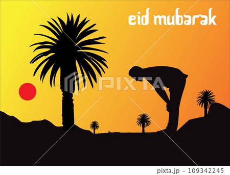 A man silhouettes against a sunset sky as he prays under a palm tree in the desert. 109342245