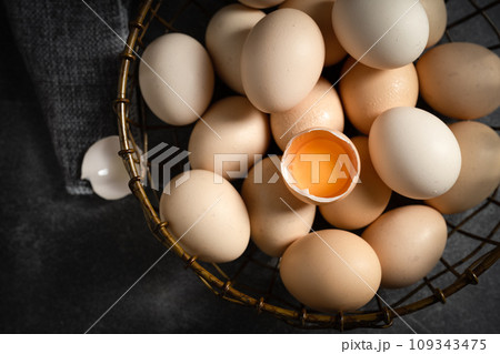 fresh eggs in a basket fresh eggs in a basket 109343475