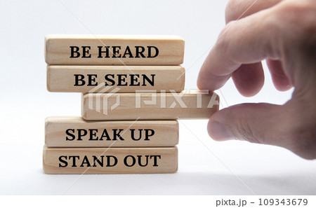 Be heard, be seen, speak up, stand out text on wooden block. Business concept. 109343679