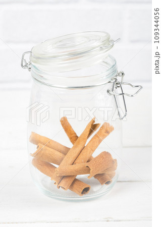 Spice spice cinnamon in glass bottle Spice spice cinnamon in glass bottle 109344056