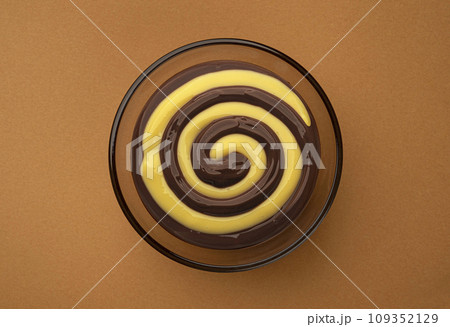 Chocolate and banana cream swirl, top view 109352129