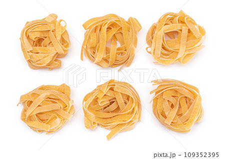 Six Classic Italian Raw Egg Fettuccine - Isolated on White Background Six Classic Italian Raw Egg Fettuccine - Isolated on White Background 109352395
