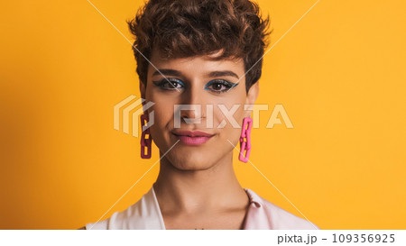 Transgender woman in make up posing while smiling at the camera Transgender woman in make up posing while smiling at the camera 109356925