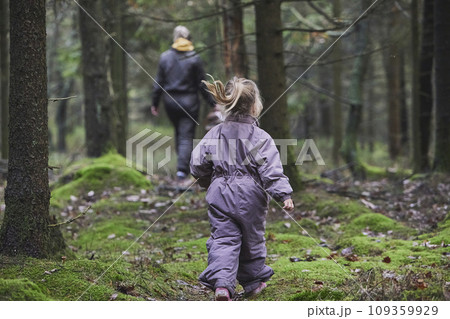 Mother with daughter walk in the forest in Denmark 109359929