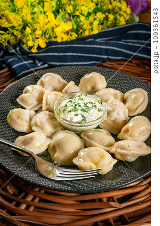 Pelmeni - russian national kitchen. Pelmeni - russian national kitchen. 109361543