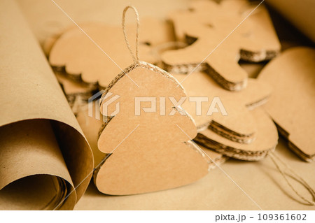 Cardboard toys for the Christmas tree or garland. Creative decorations. Selective Focus Cardboard toys for the Christmas tree or garland. Creative decorations. Selective Focus 109361602