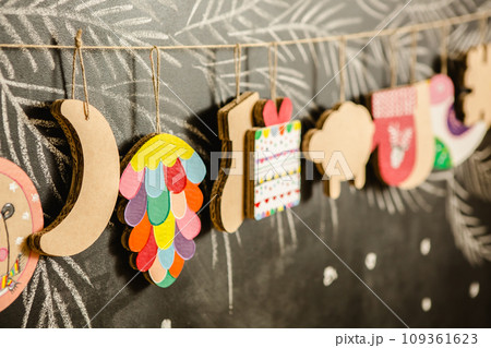 Cardboard toys for the Christmas tree or garland. Creative decorations. Selective Focus Cardboard toys for the Christmas tree or garland. Creative decorations. Selective Focus 109361623