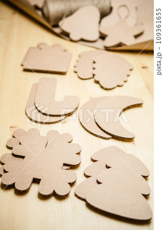 Cardboard toys for the Christmas tree or garland. New year decorations. Cardboard toys for the Christmas tree or garland. New year decorations. 109361655