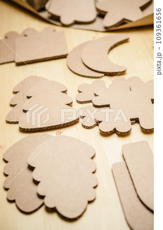 Cardboard toys for the Christmas tree or garland. New year decorations. 109361656