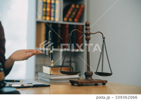 Lawyer, legal advisor, businessman brainstorming information on agreement details Business contracts in legal processing books for accuracy in contract documents. joint financial investment. Lawyer, legal advisor, businessman brainstorming information on agreement details Business contracts in legal processing books for accuracy in contract documents. joint financial investment. 109362066