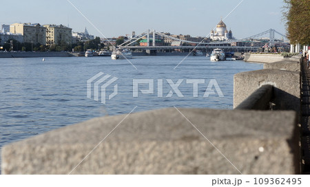 river and temple and concrete parapet 109362495