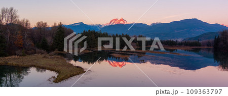 Canadian Mountain Landscape, peaceful river with green trees. Sunny Sunset. 109363797