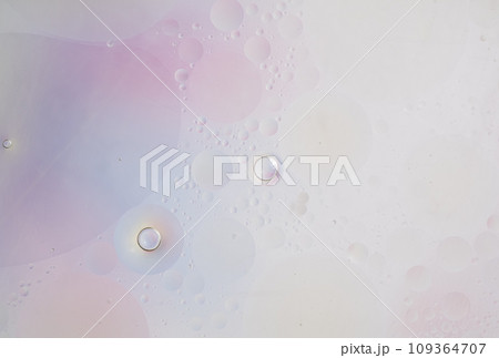 Beautiful small bubbles of oil on surface of the water. Delicate 109364707