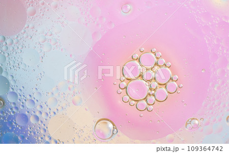 Abstract background in blue and pink soft tones. Macro drops of oil on 109364742