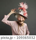 lifestyle photo humor an elderly old dancer with funny hat 109365032