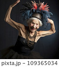 lifestyle photo humor an elderly old dancer with funny hat 109365034