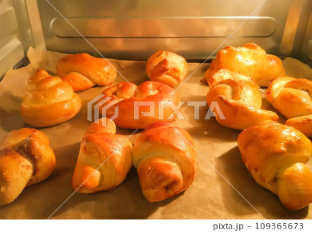 Homemade pastry in the oven in cooking process. 109365673