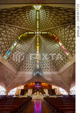 Aisle view with pews and altar with ceiling view of Cathedral of Saint Mary of the Assumption 109367712