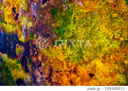 Textured and wiggly green and yellow amid swirls of color in abstract background asset Textured and wiggly green and yellow amid swirls of color in abstract background asset 109368012