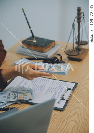 Lawyer, legal advisor, businessman brainstorming information on agreement details Business contracts in legal processing books for accuracy in contract documents. joint financial investment. Lawyer, legal advisor, businessman brainstorming information on agreement details Business contracts in legal processing books for accuracy in contract documents. joint financial investment. 109372545