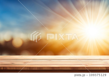 Empty wood tabletop or counter with display product. Blur image of blue sky and hill background. Display product background Empty wood tabletop or counter with display product. Blur image of blue sky and hill background. Display product background 109375129