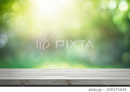 Empty wood tabletop or counter with display product. Blur image of green leaves bokeh background. Display product background concept 109375840