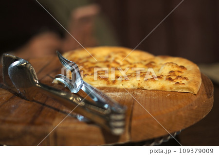 khachapuri georgian pies on a soft dark background 109379009