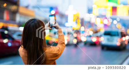 Young Asian tourists standing selfie taking a photo Young Asian tourists standing selfie taking a photo 109380820