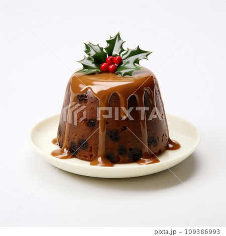 Christmas Pudding With a Sprig Of Holly Isolated On A White Background. 109386993