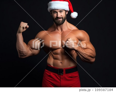 Santa Claus fitness trainer. A muscular man in a gym Santa Claus fitness trainer. A muscular man in a gym 109387184
