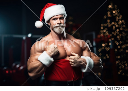 Santa Claus fitness trainer. A muscular man in a gym Santa Claus fitness trainer. A muscular man in a gym 109387202