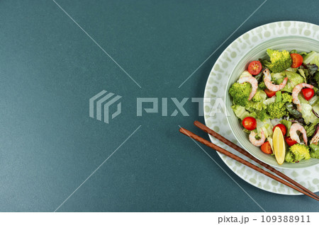 Salad with broccoli and shrimp, Asian food. 109388911