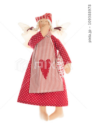 Handmade doll in red dress with heart maded from red color natural cotton linen material. Handmade doll in red dress with heart maded from red color natural cotton linen material. 109388978