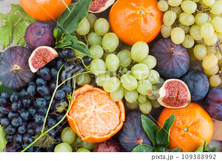 Bright fruit. Healthy food background. Diet, nutrition and vitamin concept Bright fruit. Healthy food background. Diet, nutrition and vitamin concept 109388992