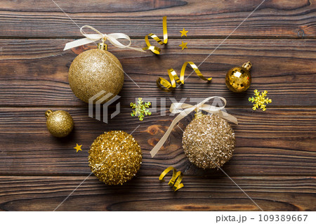 Christmas ball on colored background. decoration bauble with ribbon bow with copy space 109389667