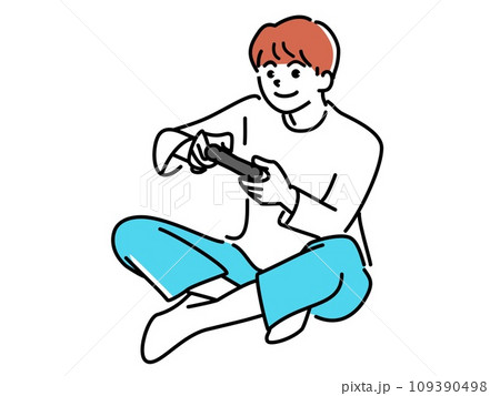 あぐらをかいてゲームをしている男の子　色 109390498