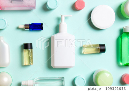 Group of plastic bodycare bottle Flat lay composition with cosmetic products on colored background empty space for you design. Set of White Cosmetic containers, top view with copy space 109391058