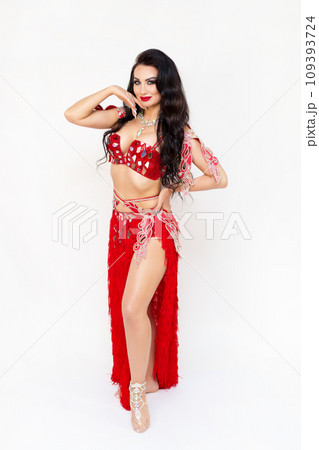 Portrait of the head of a female oriental dance studio, red dress, white background 109393724
