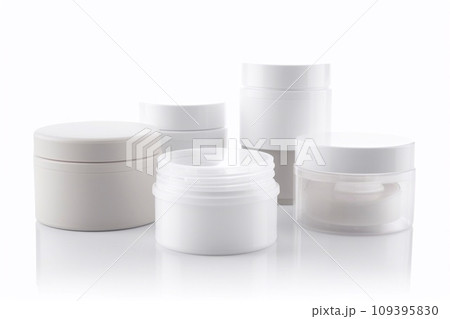 Cosmetic package. Rounded cleaning cream plastic tube box container top and side view mockup isolated 109395830