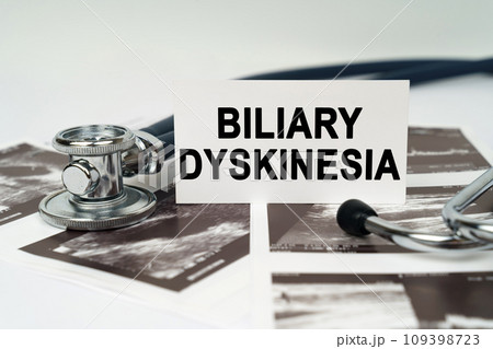 On the ultrasound pictures there is a stethoscope and a business card with the inscription - Biliary dyskinesia On the ultrasound pictures there is a stethoscope and a business card with the inscription - Biliary dyskinesia 109398723