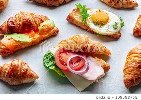 Croissant sandwich assortment. Various stuffed croissants. Filled rolls 109398758