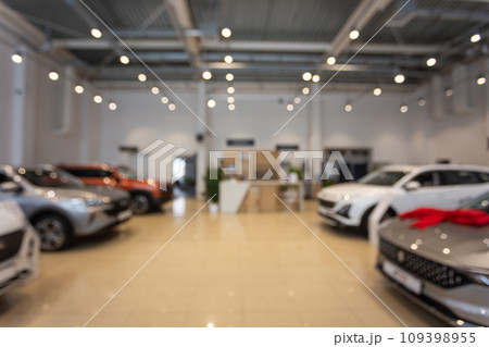 Blurred new car parked in modern showroom waiting for sales. 109398955