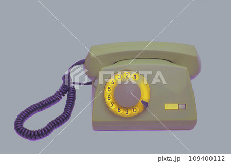 Vintage telephone isolated on grey background Vintage telephone isolated on grey background 109400112