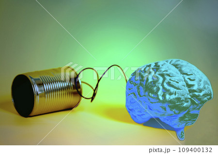 tin can phone with human brain anatomical model. communication concept 109400132